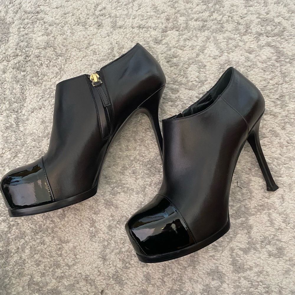 Yves Saint Laurent Tribute Platform Ankle Boots
Navy Blue Calf Leather